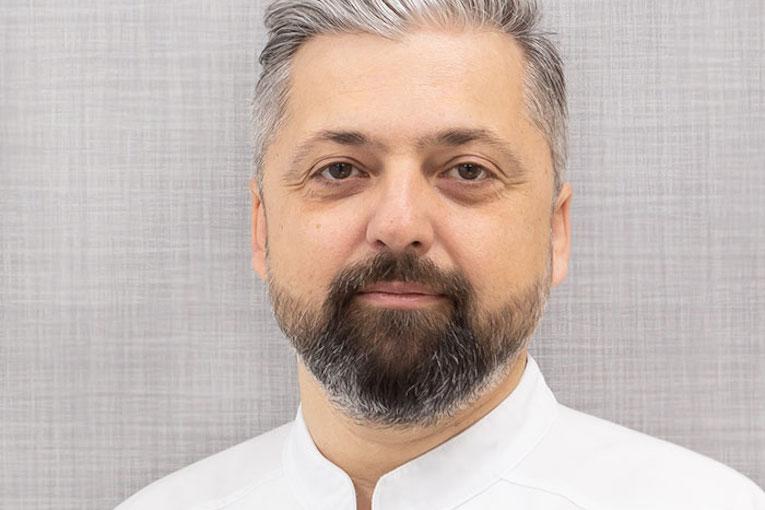 Dr. Dragos Palade